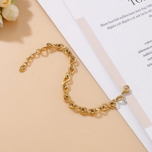 Élégant bracelet à maillons infinis doré en acier inoxydable avec fermoir mousqueton