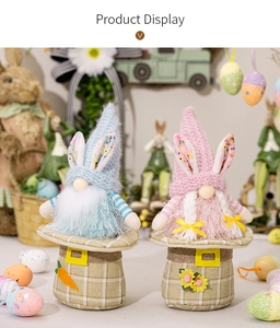 Detail of blue and pink Easter gnomes with rabbit ears on plaid top hat bases