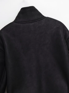 Detail of the high-quality black faux suede fabric texture on the back of the jacket