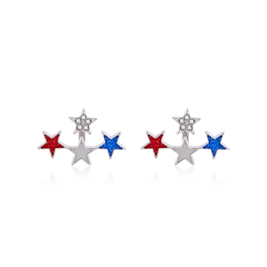 Detail view of silver star earrings with red and blue enamel and sparkling rhinestones