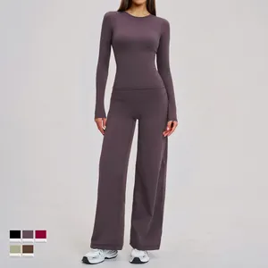 Women's dark purple brushed yoga set with long sleeve top and wide leg pants