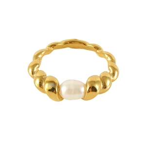 Minimalist twisted golden ring with white pearl center on a clean white background