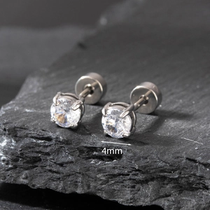 Macro shot of 4mm round cubic zirconia stud earrings in a four-prong stainless steel setting