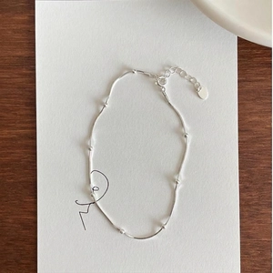 Minimalist 925 sterling silver beaded anklet featuring a fine snake chain and lobster clasp
