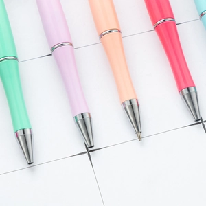 Colorful heart-shaped twist ballpoint pens with streamlined plastic barrels for office use