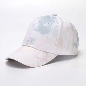 Detailed view of tie-dye baseball cap showing blue and pink gradient fabric textures