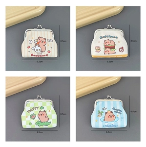 Detail of four colorful capybara coin purses with metal clasps and 9.5x8.5cm dimensions