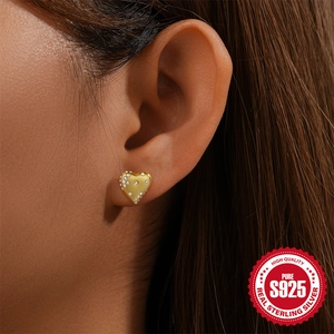 Elegant gold S925 sterling silver heart stud earrings with sparkling white crystals for women