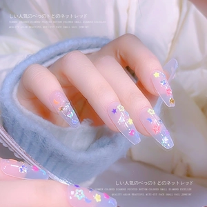 Long ballerina press-on nails with colorful star and moon glitter in jelly finish