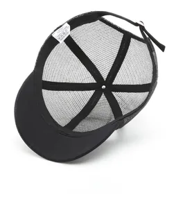 Detail view of the breathable mesh baseball cap interior with 100% cotton label