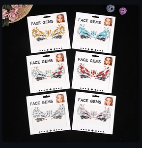 Six sets of colorful face gems for festivals featuring amber, blue, red, and pink crystal designs