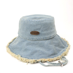 Light blue denim sun hat with frayed brim and adjustable chin strap on white background