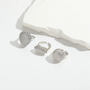 Adjustable silver rings with pear and marquise-cut pavé zircons on white stone
