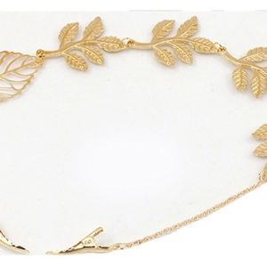 Elegant gold leaf tassel hair chain with metal leaf clips and dangling headpiece links
