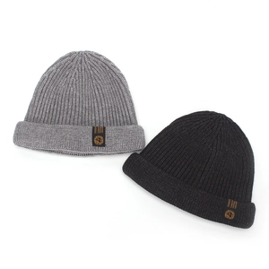 Men's outdoor knit docker cap in grey and black featuring ribbed texture and side label