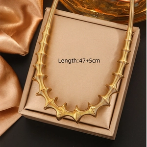 Gold spiral spring necklace in 18K titanium steel on silk, length 47+5cm