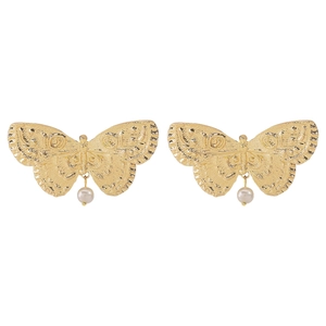 Detailed view of vintage gold butterfly earrings featuring elegant white pearl drops