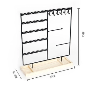 Black metal jewelry organizer with wooden base for earrings and necklaces 35x30cm