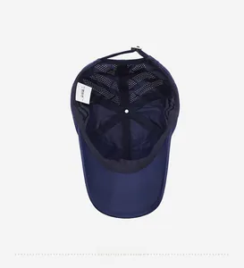 Detailed inner mesh structure of breathable navy blue baseball cap with support stitching