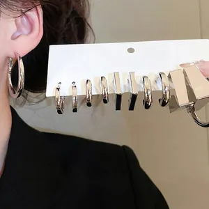 Set of 6 minimalist silver-plated C-shape geometric hoop earrings with polished finish