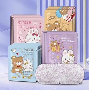 Close-up of assorted lavender steam eye masks with cute cartoon characters packaging