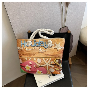 Detail of holiday canvas tote bag with pink flip-flops and 3D blue Holiday lettering