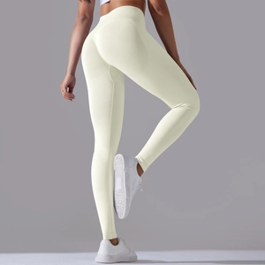 Rear view of cream seamless yoga leggings showing high waist and peach butt lift effect