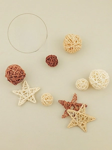 Macro detail of hand-woven rattan balls and star photography props in natural tones