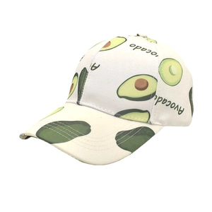 Detail of white cotton baseball cap showing green avocado print and Avocado text