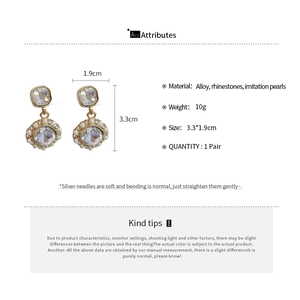 Detailed size specifications and material chart for vintage pearl drop earrings