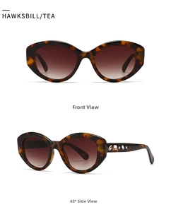 Detail of oval tortoiseshell sunglasses with crystal embellishments and tea gradient lenses