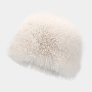 Winter fluffy white faux fur bucket hat with long plush hair for warm outdoor protection
