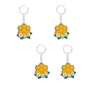 Set di 4 portachiavi in ​​PVC a nido d'ape con ciondoli a margherita bianca