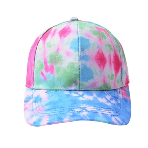 Detail of colorful tie-dye baseball cap with pink, blue, and green swirl pattern