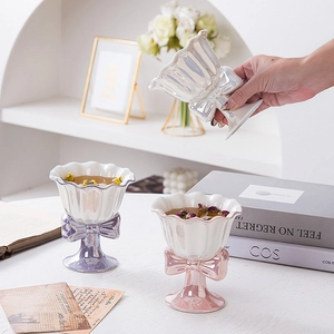 Elegant bow ceramic goblet set with pearlescent finish in white, purple, and pink colors