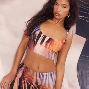 Women's 2-piece printed set with crop top and high-waist skirt in abstract orange and purple