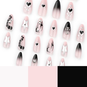 Pink and black gradient press-on nails with heart, cross, and leopard print designs