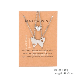 Matching butterfly heart magnet necklaces in stainless steel for couples and friends