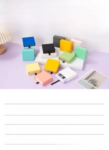 Detail of drawer-style PE film display boxes in various macaron colors for jewelry storage