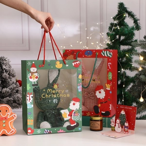 Christmas hollow gift bags with plush rabbit dolls and festive ornaments in holiday setting