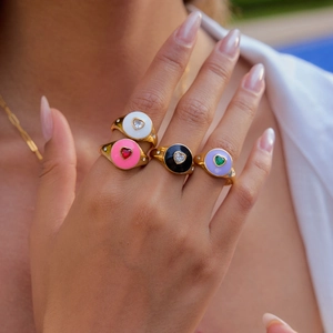 Stackable heart rings with colorful enamel and sparkling zircons in 18K gold plated steel