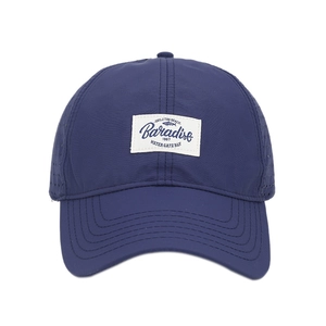 Navy blue quick-dry baseball cap with laser-cut ventilation holes and woven logo patch