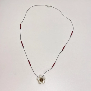 French vintage necklace with pearl flower pendant on black cord with red beads