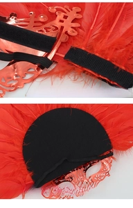 Detail of red feather mask with detachable Velcro design and soft back padding for comfort