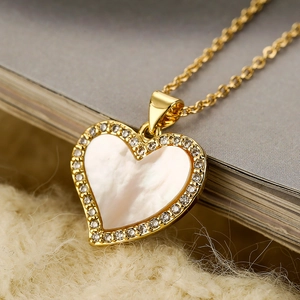 Elegant 18K gold plated heart necklace featuring white mother of pearl and zircon stones