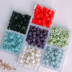 Macro view of colorful cylindrical acrylic beads for DIY jewelry and phone charms