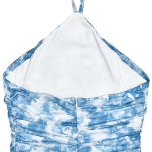 Detail view of ruched back and zipper closure on blue tie-dye halter dress