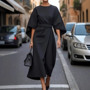 Elegant black maxi dress with dramatic batwing sleeves and a tied waist for women