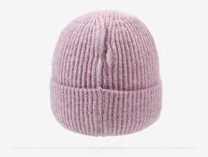 Detailed back view of a lavender pink ribbed knit beanie with soft warm texture