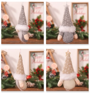 Detailed view of gray and beige Christmas gnomes ornaments with soft knit and faux fur